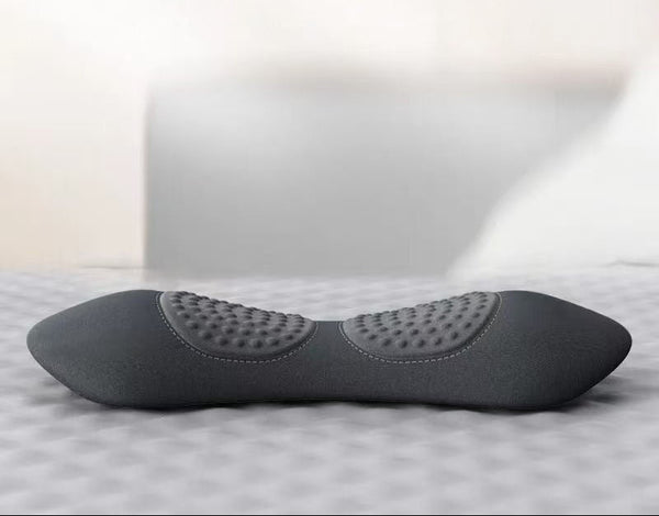 Person using REVILIO for back pain relief