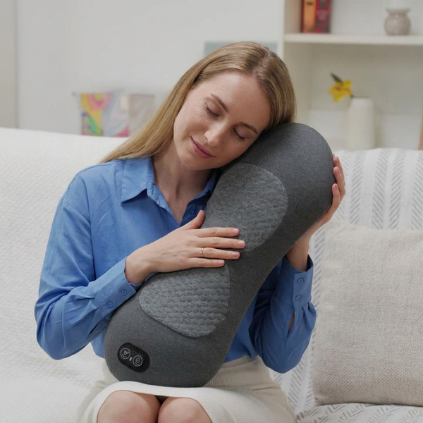 Person using REVILIO for back pain relief